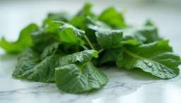 Leafy Greens for Liver Detoxification"

Alt Text: "A vibrant bunch of leafy greens, such as spinach and kale, highlighting their role in supporting liver detoxification